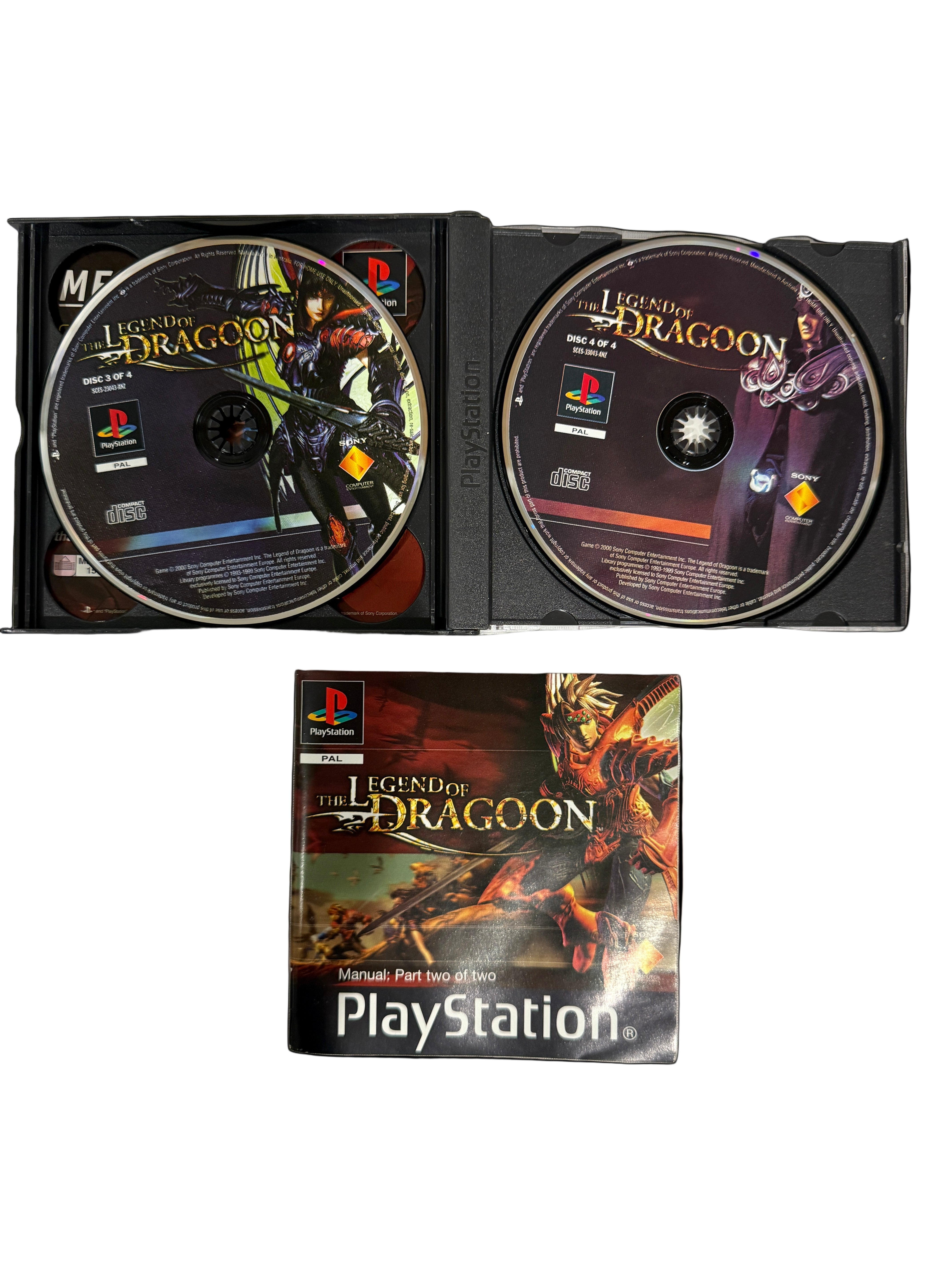PlayStation game 'Legend of Dragoon' with two discs and a manual on a white background