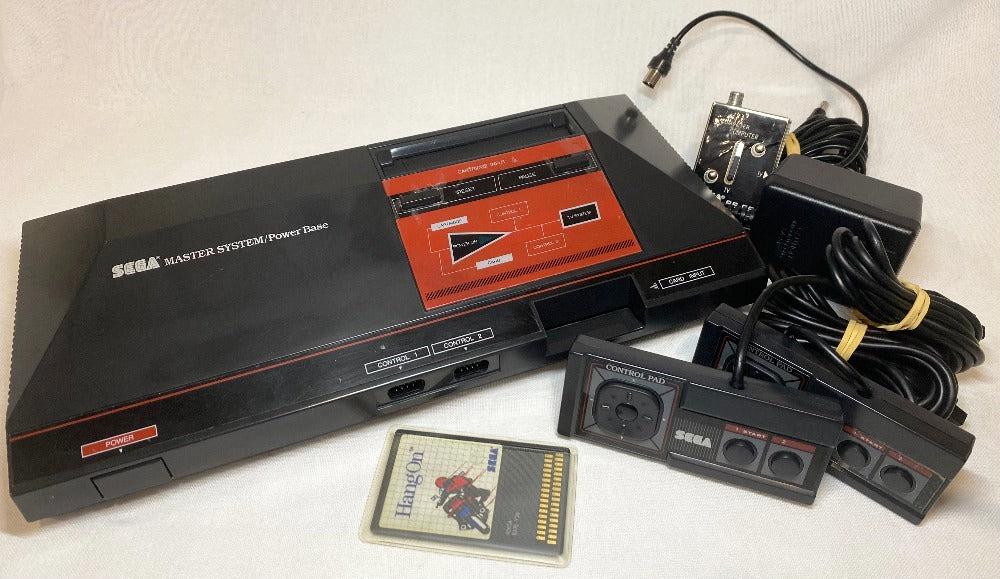 Console de jeux vidéos SEGA Master System I, avec bloc d'alimentation Console de jeux vidéos SEGA Master System I, avec bloc d'alimentation